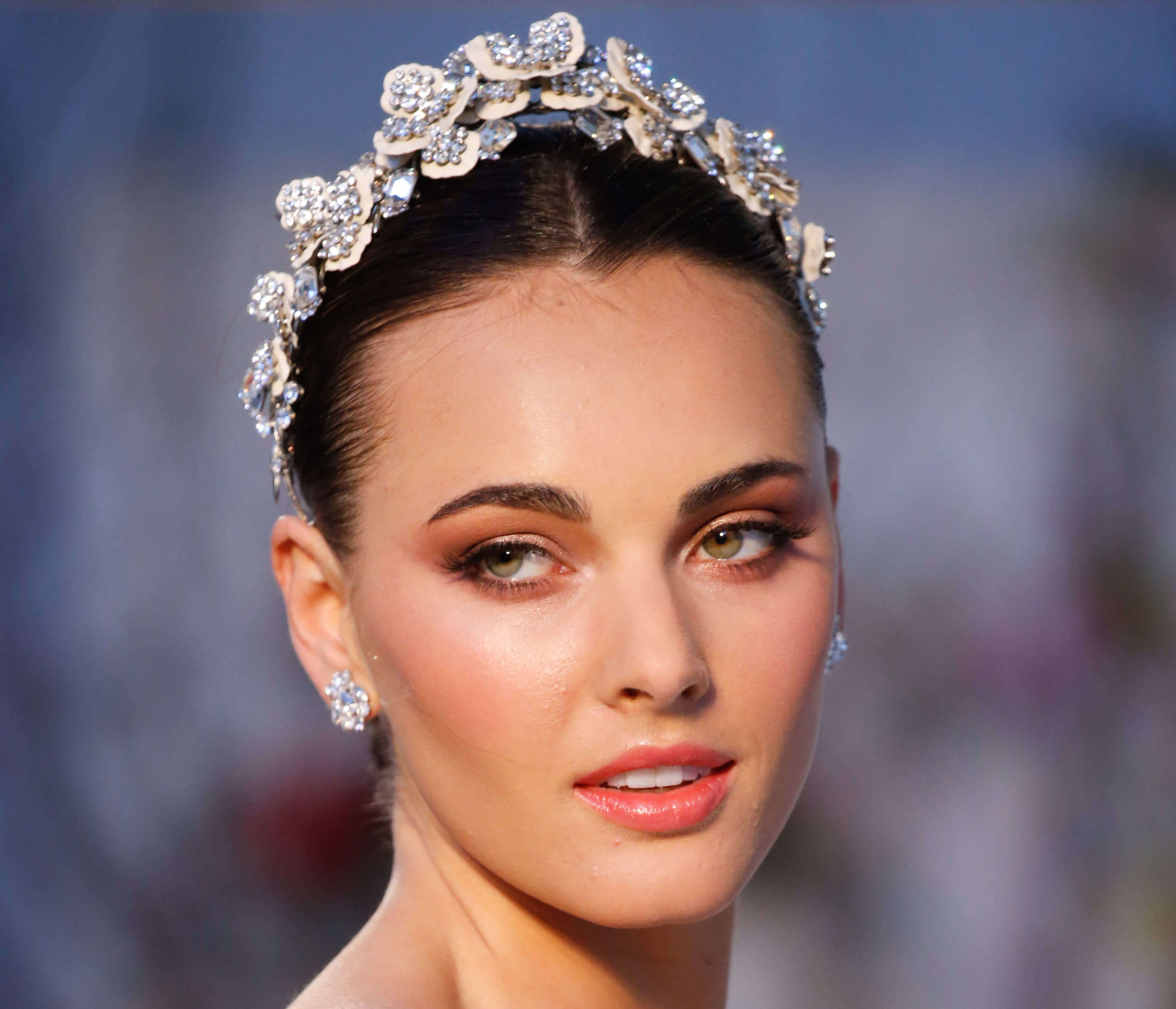 sleek bun with headpiece bridal hairstyle for short hair