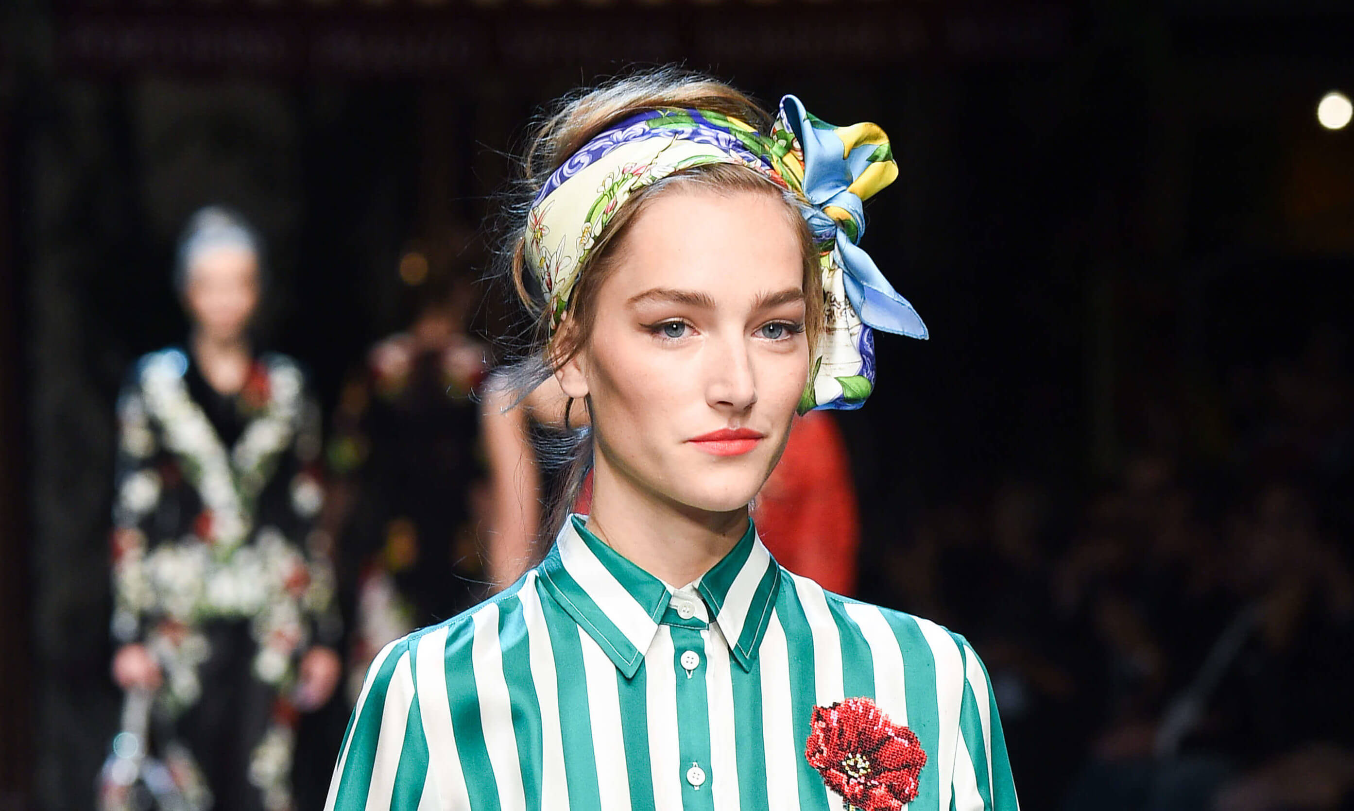 runway model with striped top and a colourful bandana