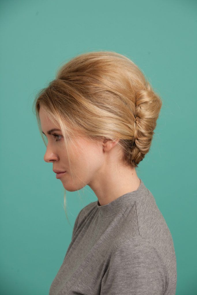 a side view of a french twist woman