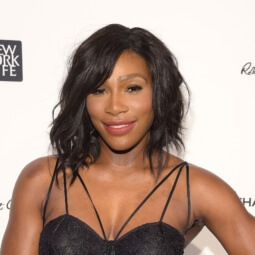 serena williams on the red carpet with her hair worn in a wavy, asymmetrical long bob