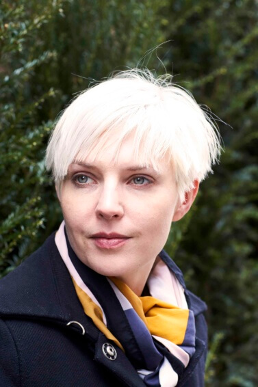 Woman with short bleached hair
