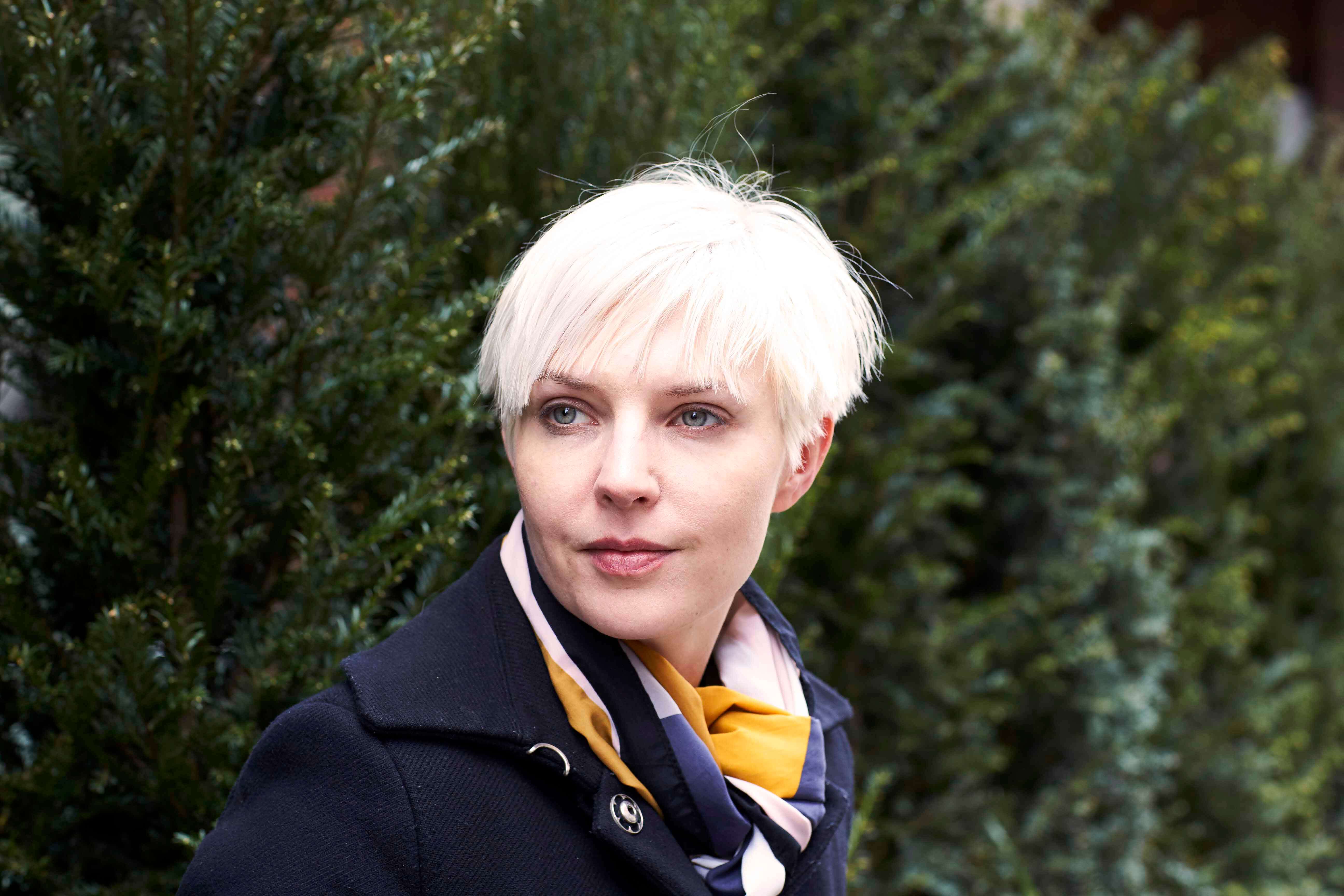 Woman with short bleached hair