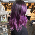 purple balayage on dark hair