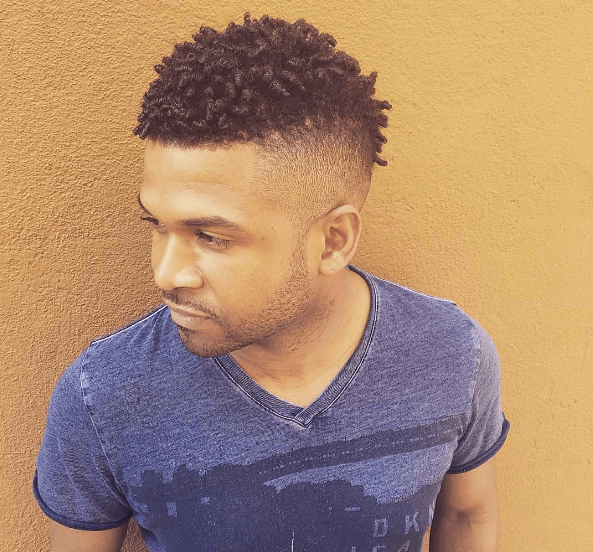 Mohawk hairstyles for men: Frohawk hairstyle on young black man from Instagram