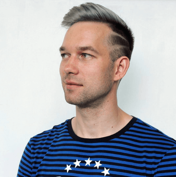 Silver blonde mohawk with shaved lines