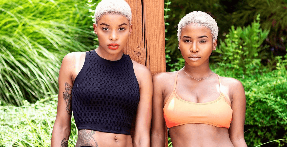 close up shot of two black women with blonde small afro hairstyles
