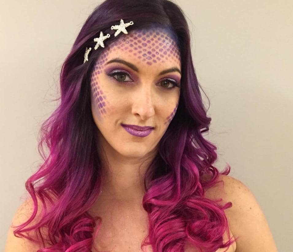 Woman with bold purple ombre hair from Instagram by @hair_by_danajoy