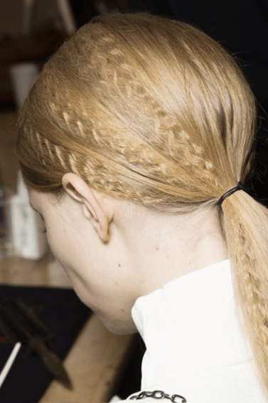model with crimped crimped hair back view showing ponytail hairstyles for long hair
