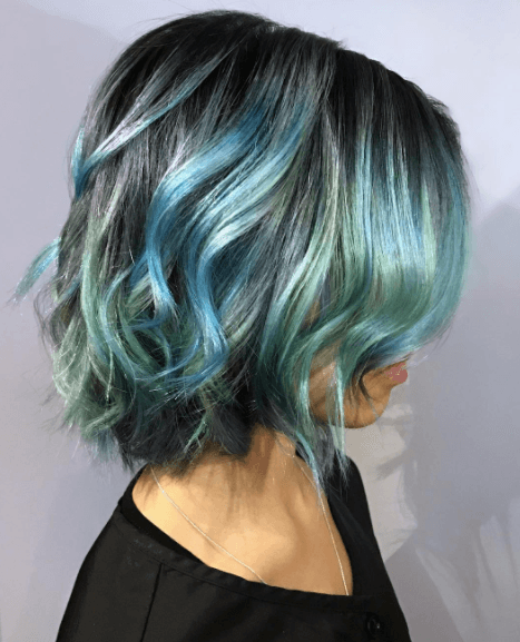 Woman with dark mermaid hair from Instagram @vancouvhair