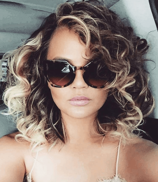 1980s hairstyles Chrissy Teigen new curly hair