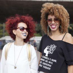 Coloured afro hair styles: 2 natural haired women with red and highlighted afro