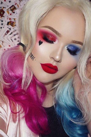 Girl wearing a Harley Quinn inspired wig with pink and blue