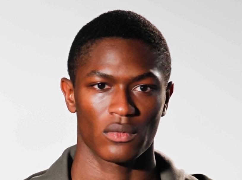 front facing image of a black man with a buzz cut