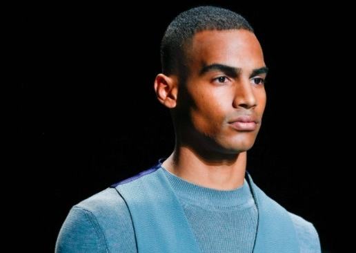 side view image of a black man with a short fade hair cut - black men's hairstyles