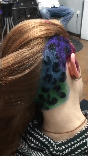 rainbow leopard undercut on woman with brown hair