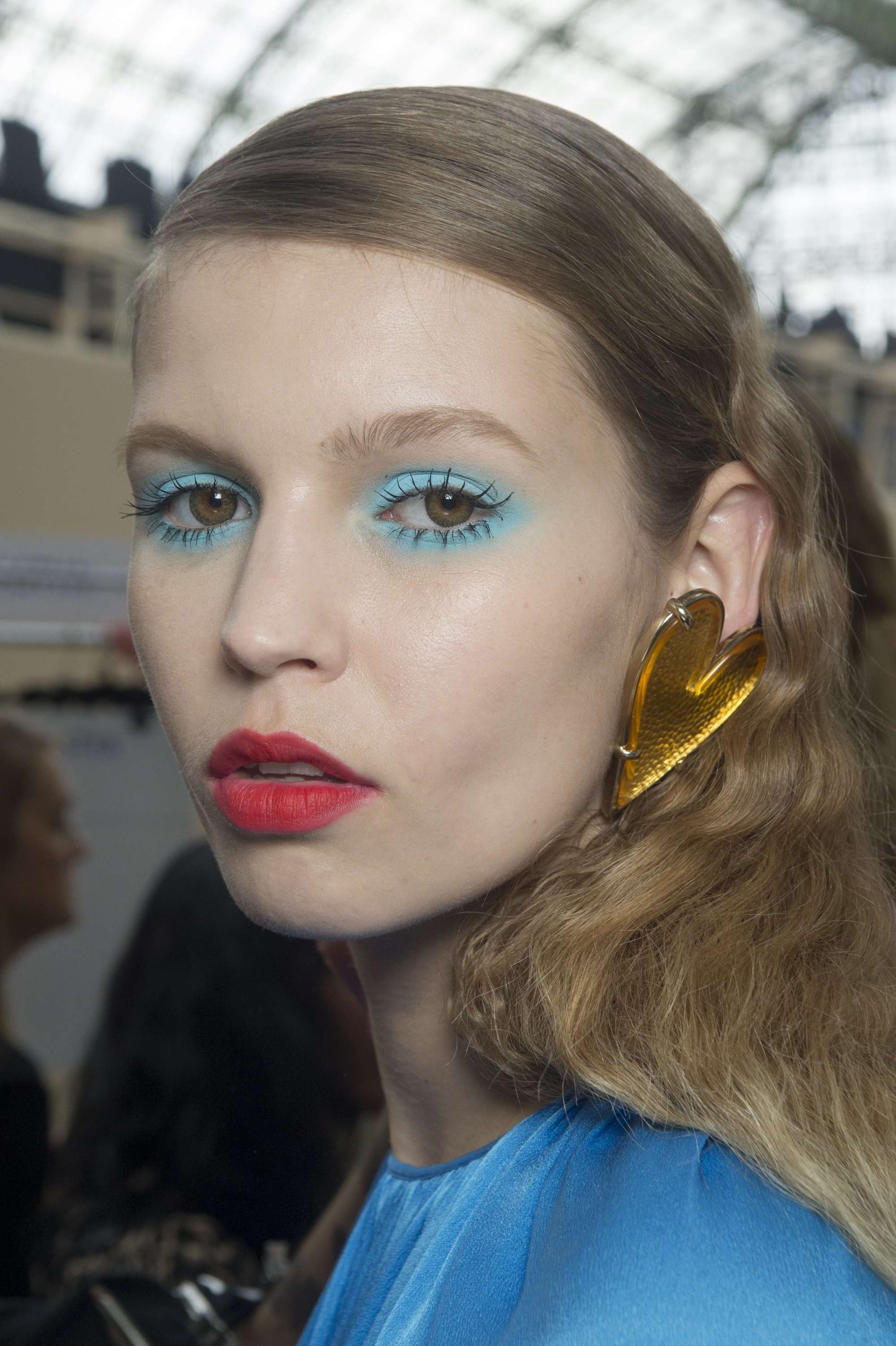light brown hair: model with light ash brown hair backstage shot