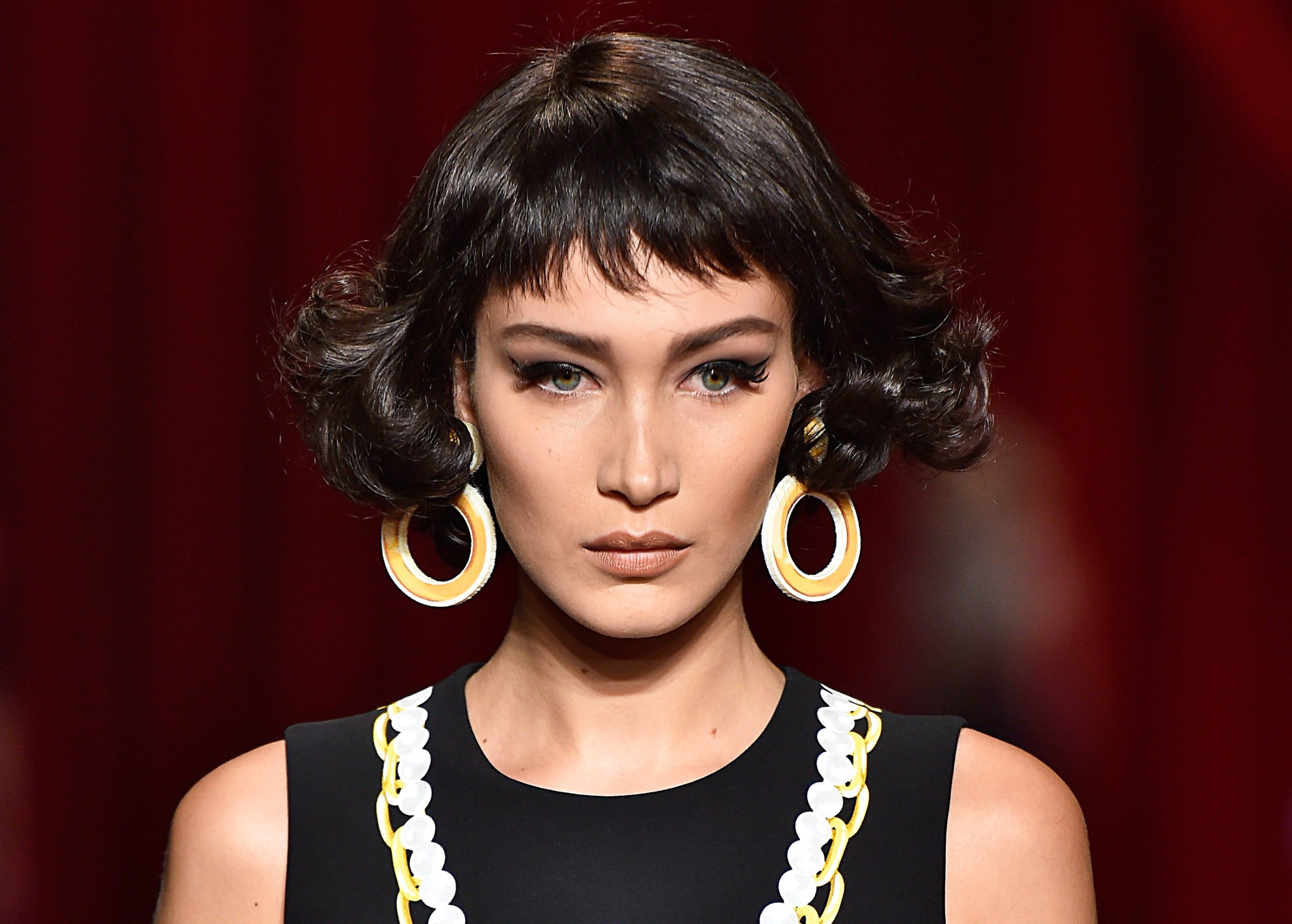Bella Hadid short curly bob Moschino SS17