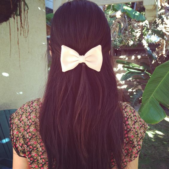 half-up half-down wedding hairstyles: pretty bow