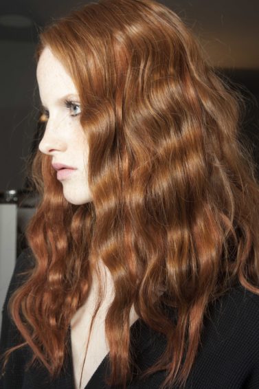 Hair straightener: wavy red hair