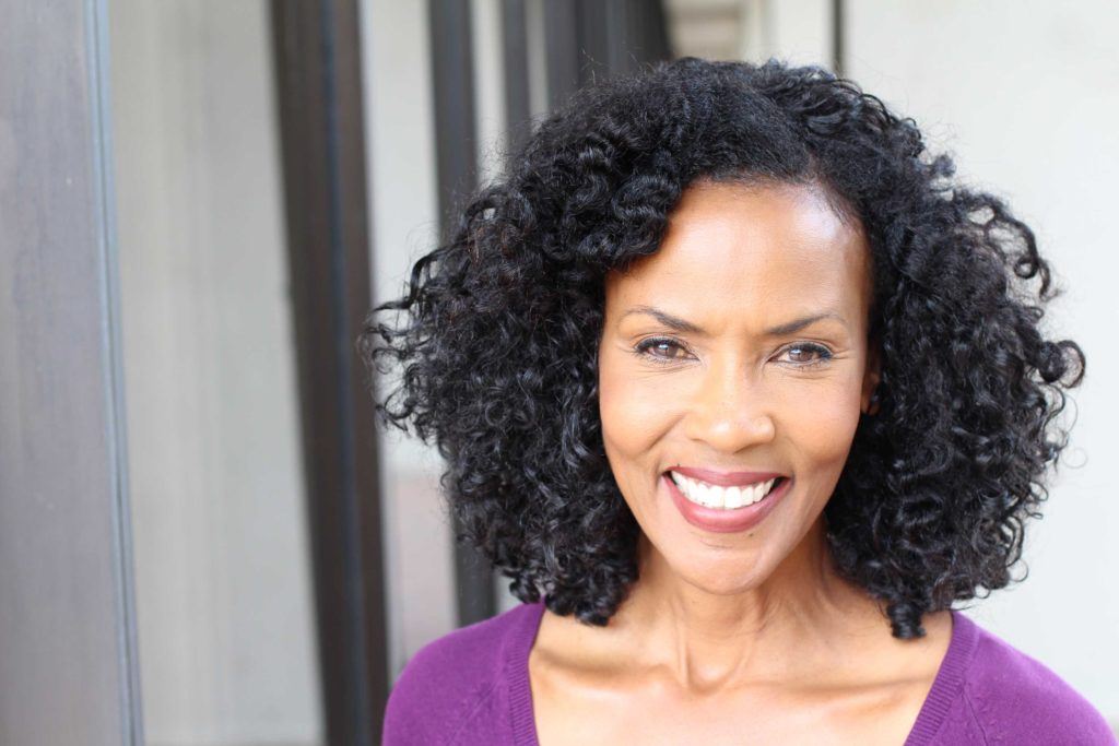 short hair for over 50 can be styled like this natural-haired lady