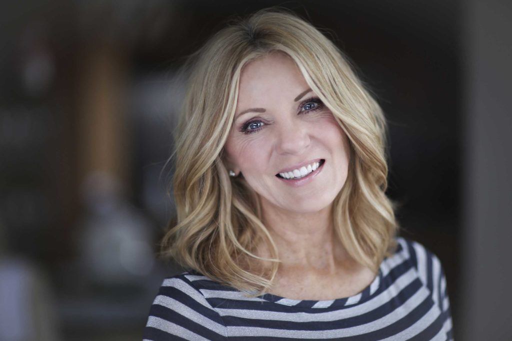 short hairstyles for over 50s look great with highlights like this blonde-haired women shows