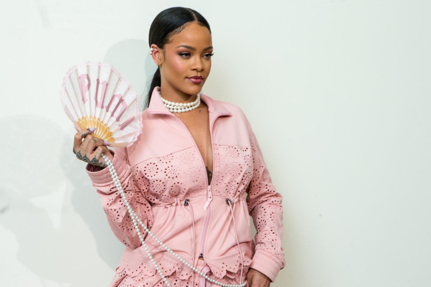 Easy updo - Slick back centre part ponytail on Rihanna