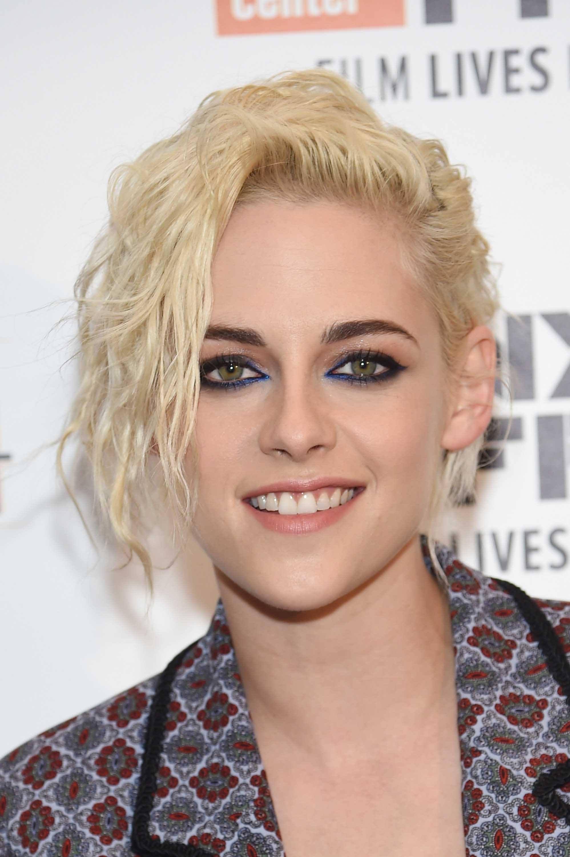 Kristen Stewart with a bleach blonde wavy bob
