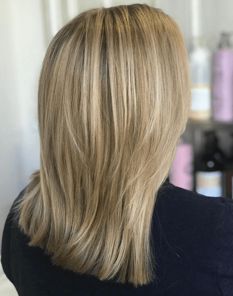 back view image of a woman with sandy blonde hair - blonde brown hair