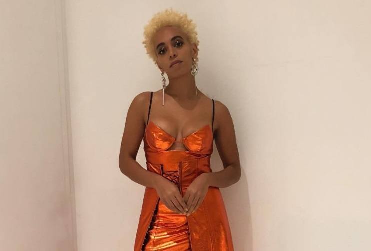 close up shot of solange knowles with blonde afro