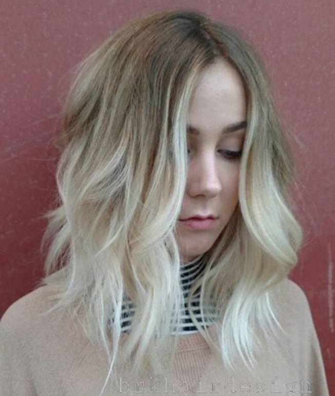 Short trendy hairstyles: Blonde girl with ombre bob and lived in texture