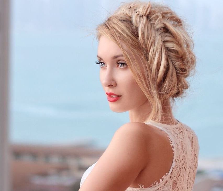 updos for long hair: model with fishtail braided halo hairstyle