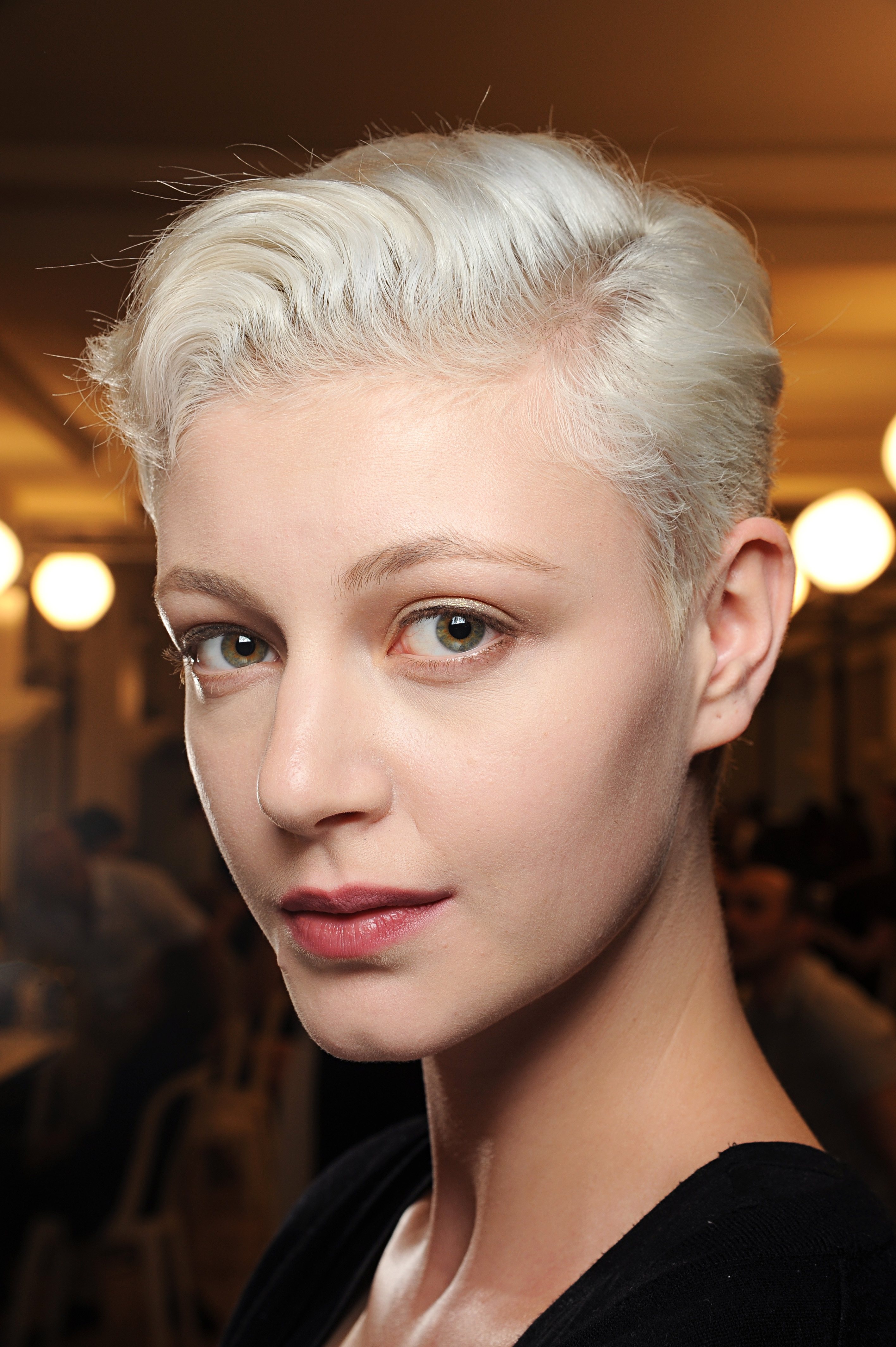 platinum blonde pixie hair slicked