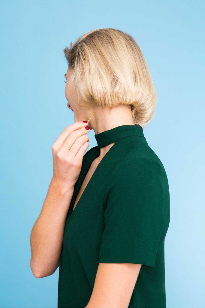 Blonde woman pinning faux bob
