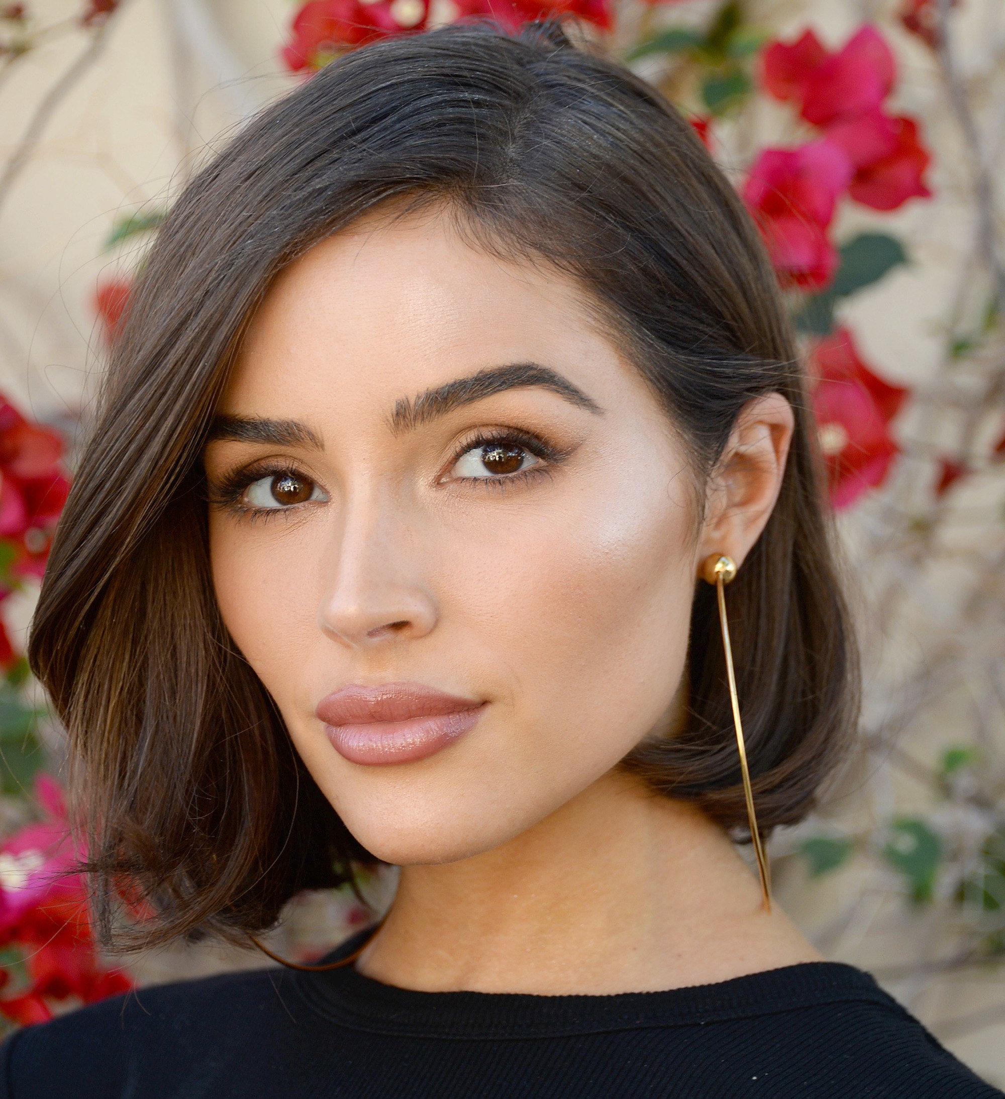Olivia Culpo with a brown blunt bob
