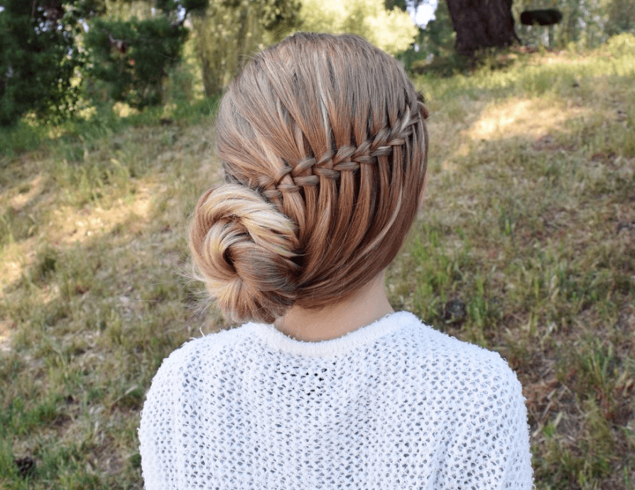 up hairstyles for long hair: backshot of model with side twisted bun