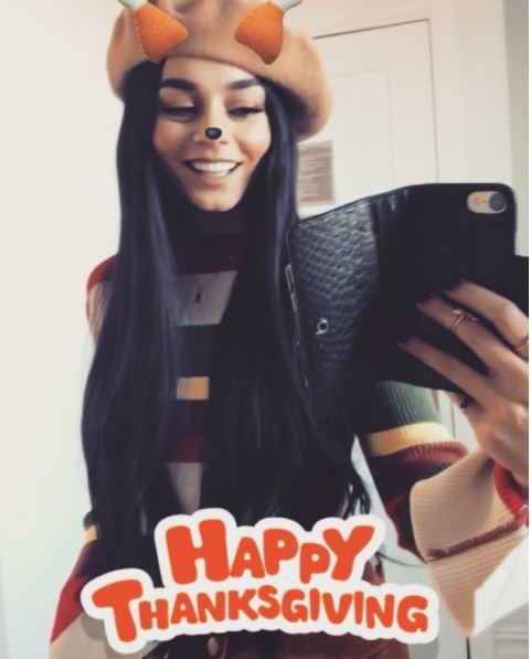 vanessa hudgens mirror selfie with long black straight rapunzel length hair and filter