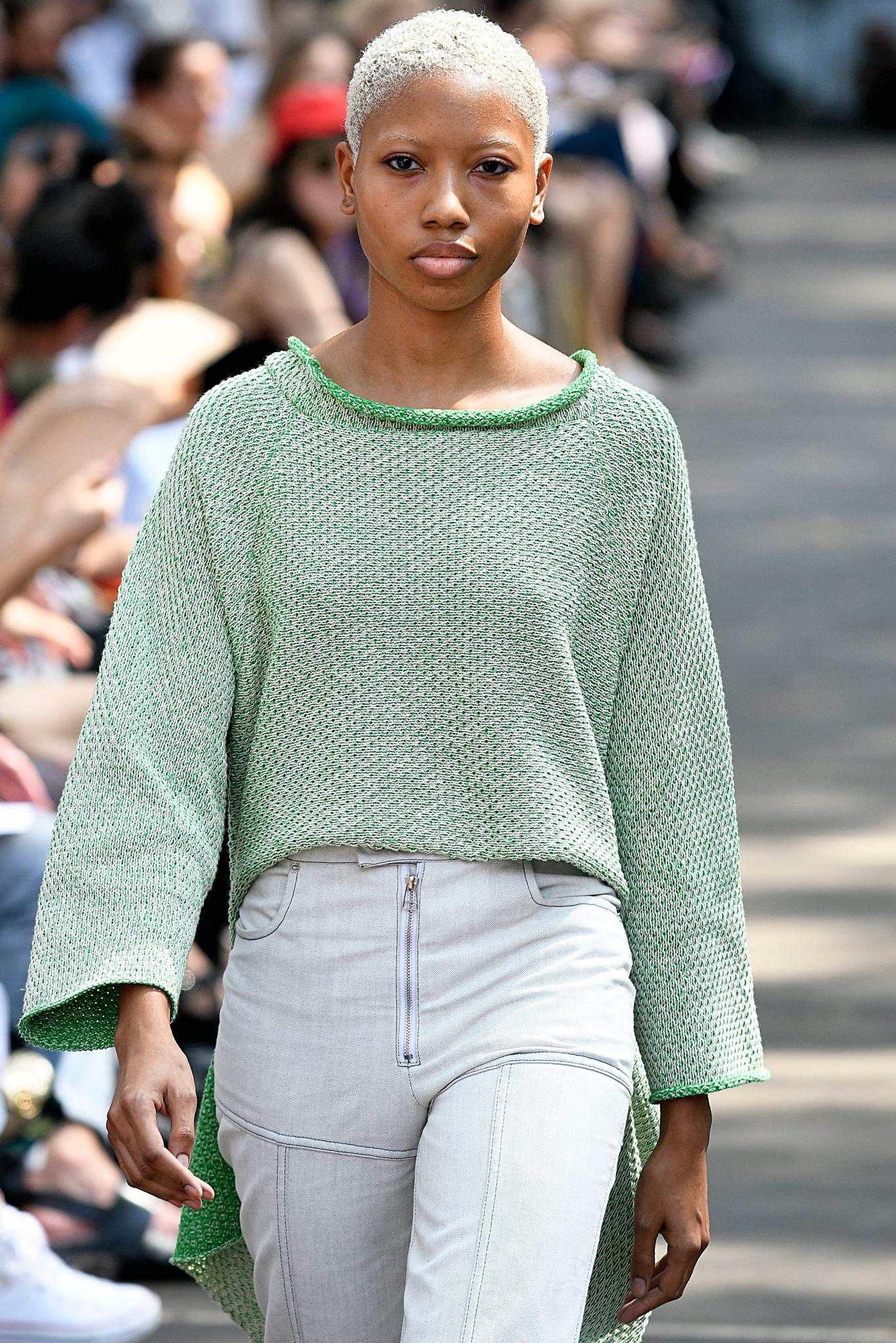 Black model with white blonde short afro TWA