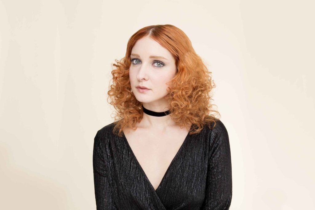 hairstyles for curly hair: All Things Hair - IMAGE - red ginger curly hair slicked centre parting tutorial