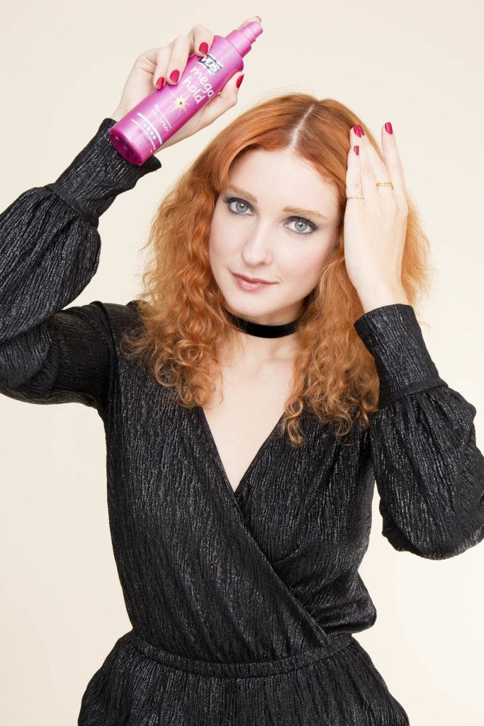 hairstyles for curly hair: All Things Hair - IMAGE - red ginger curly hair slicked centre parting tutorial gel spray