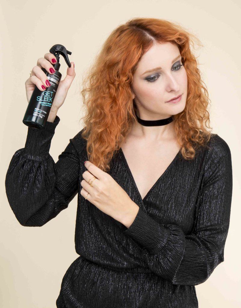 hairstyles for curly hair: All Things Hair - IMAGE - red ginger curly hair slicked centre parting tutorial