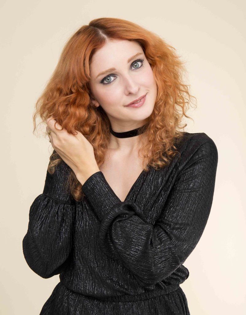 hairstyles for curly hair: All Things Hair - IMAGE - red ginger curly hair slicked centre parting tutorial