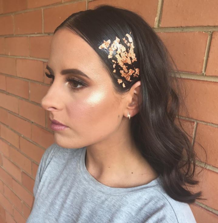 Hair foil - brown hair with waves and gold foil on one side of hair