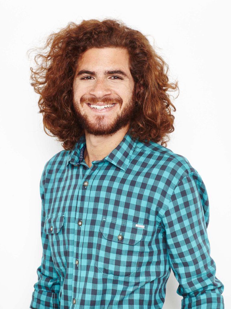 man with curly brown hair