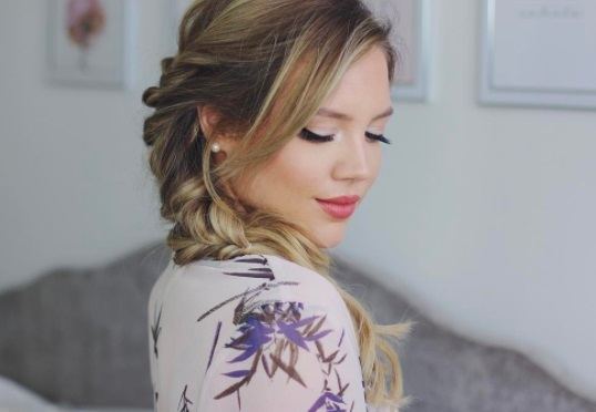 ellepearls with side braided ponytail hairstyle wearing floral dress