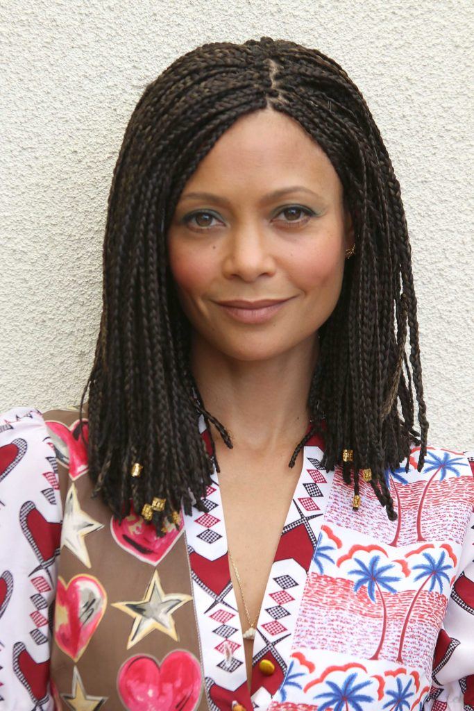 close up shot of thandie newton on the red carpet with box braid bob on the red carpet