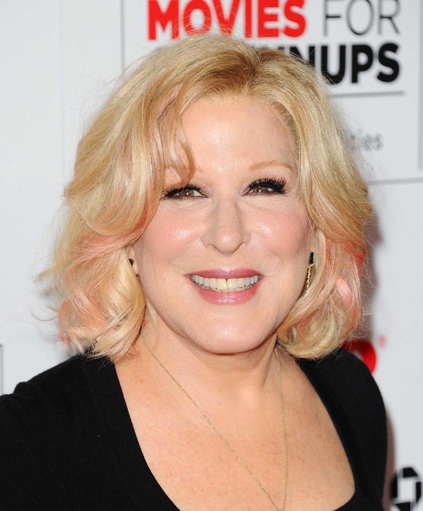 mature celebrities haircuts Bette Midler with pastel pink hair