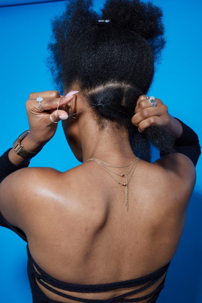 How to do box braids tutorial woman with afro hair parting it and tying with hairband