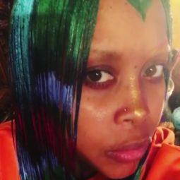 Erykah Badu with multi-coloured hair