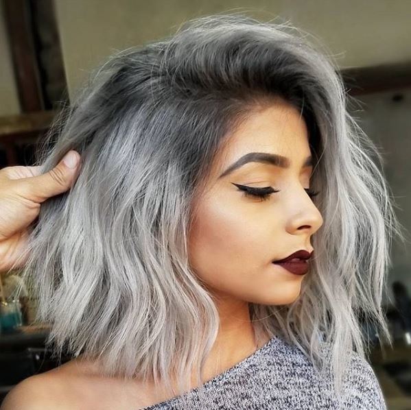 Instagram pic from @yigityesil34: Asian woman with wavy bob and steely grey ombre hair