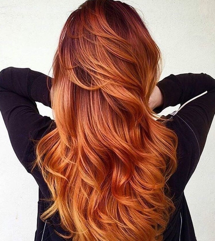 Woman with long ginger hair hygge trend